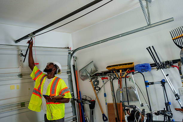 Professional Garage Door Panel Replacement technician working in Hilltop, MN