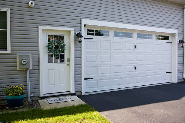 24/7 Emergency Garage Door Panel Replacement experts in Hilltop, MN